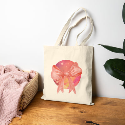Pink/Yellow Planet Wrapped In A Bow Cotton Canvas Tote Bag