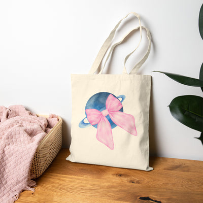 Blue Saturn Wrapped In Pink Bow Cotton Canvas Tote Bag
