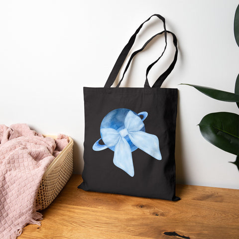 Blue Saturn Wrapped In Blue Bow Cotton Canvas Tote Bag