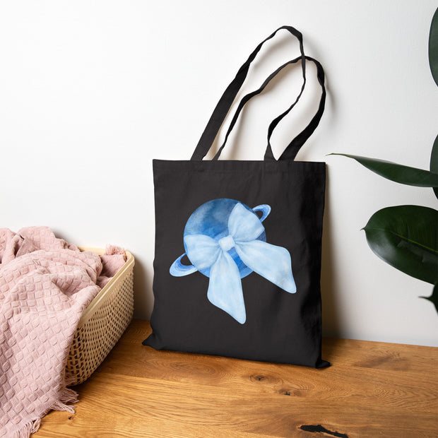 Blue Saturn Wrapped In Blue Bow Cotton Canvas Tote Bag
