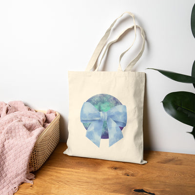 Blue/Green Planet Wrapped In A Bow Cotton Canvas Tote Bag