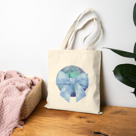 Blue/Green Planet Wrapped In A Bow Cotton Canvas Tote Bag