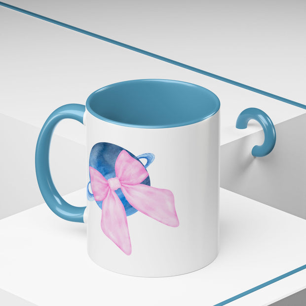 Blue Saturn Wrapped In A Pink Bow Accent Coffee Mug