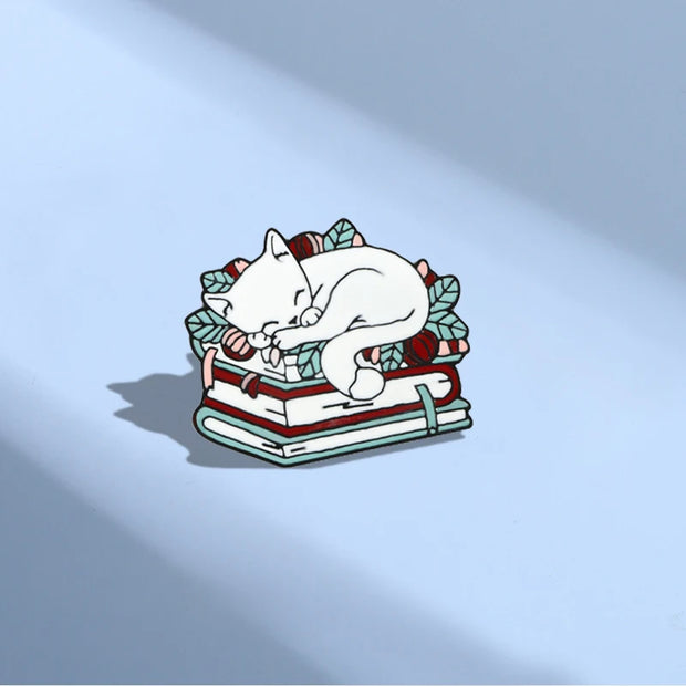 Cat Curled Up In A Book Enamel Pin