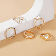 Elegance in Flight Rings Collection